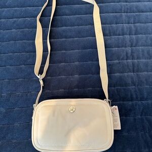 Lululemon Crossbody Camera Bag 2L  Off White  Measures 8.1x2.6x4.9 inches